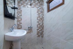 Vannituba majutusasutuses Guest House Khatuna