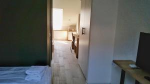 Postel nebo postele na pokoji v ubytování Arhiv Boutique House