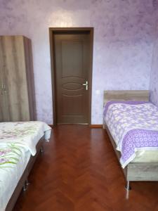 Postel nebo postele na pokoji v ubytování Guest House in Sarpi