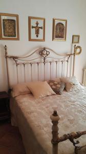 a bedroom with a large bed in a room at Casa Testa in Formia