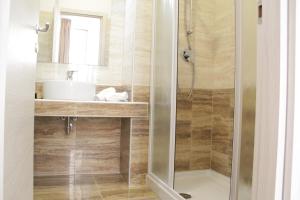Koupelna v ubytování Hotel Siro