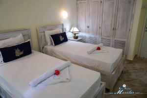 Voodi või voodid majutusasutuse Hotel Residence Marilar toas