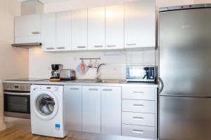 Kuchyňa alebo kuchynka v ubytovaní Marina House Corralejo Center