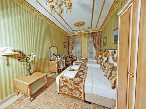 Postel nebo postele na pokoji v ubytování Glamour Classic Hotel Istanbul Sirkeci