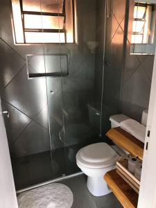 Ein Badezimmer in der Unterkunft Chalé Serra do Luar