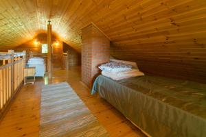 Llit o llits en una habitació de Kangru Holiday Home