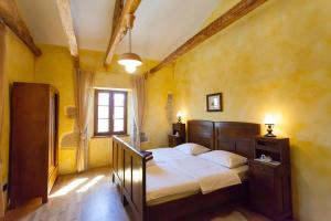 Posteľ alebo postele v izbe v ubytovaní Villa Franz Krbune + 27 fotografií