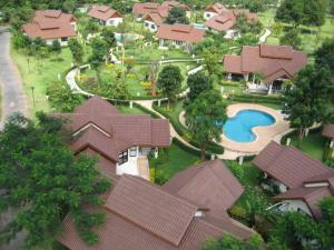 an aerial view of a house with a swimming pool at Pangrujee Resort in Nakhon Ratchasima