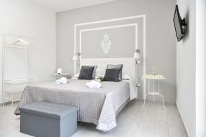 Postel nebo postele na pokoji v ubytování Insula House