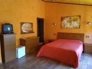 Postel nebo postele na pokoji v ubytování B&B Il Caùto