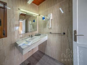 Ванная комната в Dulce Nombre Hotel - Apartamentos