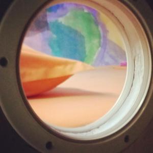 a close up of a window of an airplane at Athens centre diamond in Athens