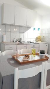 Kuchyň nebo kuchyňský kout v ubytování Apartman Kursar + 14 fotografií