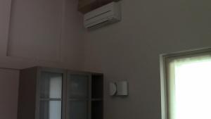 a room with a air conditioner on the ceiling at Casa Bella in Verona