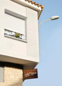 アルゲダスにあるApartamento La Noriaの通り灯窓