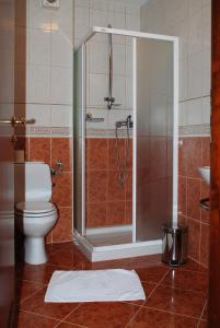 Koupelna v ubytování Hotel Zvezda