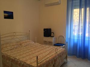 Postel nebo postele na pokoji v ubytování Casa Eleonora