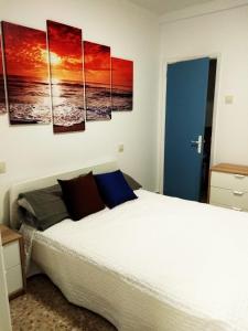 Tempat tidur dalam kamar di Mar de Rosas