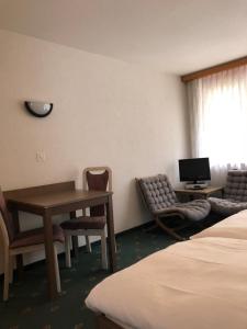 TV a/nebo společenská místnost v ubytování St Martin Apartments
