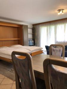 Postel nebo postele na pokoji v ubytování St Martin Apartments