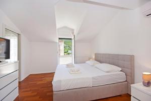 Posteľ alebo postele v izbe v ubytovaní Luxury penthouse Eva