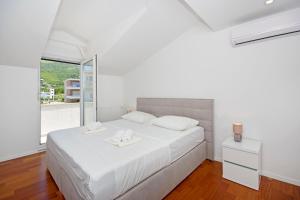 Posteľ alebo postele v izbe v ubytovaní Luxury penthouse Eva + 37 fotografií