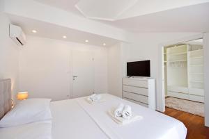 Posteľ alebo postele v izbe v ubytovaní Luxury penthouse Eva