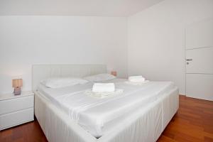 Posteľ alebo postele v izbe v ubytovaní Luxury penthouse Eva