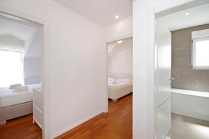 Posteľ alebo postele v izbe v ubytovaní Luxury penthouse Eva