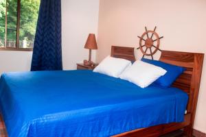 Rúm í herbergi á Hotel-Boutique Patampa