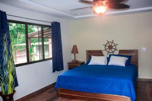 Rúm í herbergi á Hotel-Boutique Patampa