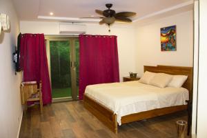 Rúm í herbergi á Hotel-Boutique Patampa