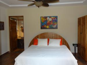 Rúm í herbergi á Hotel-Boutique Patampa