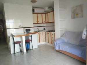 Alojamiento en Puerto Solにあるキッチンまたは簡易キッチン