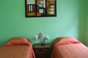 Rúm í herbergi á Hostal don Felipe