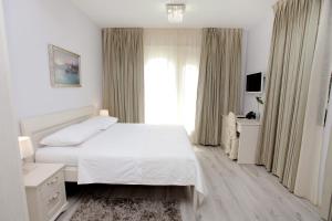Hotel Bellevue Trogir客房内的一张或多张床位