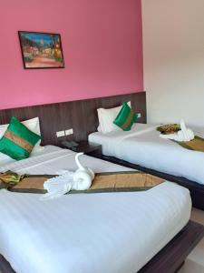 Postel nebo postele na pokoji v ubytování Lanta Lapaya Resort