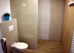 A bathroom at Apartmánový dom Mária