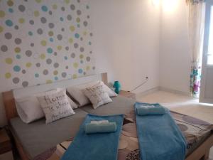 Postel nebo postele na pokoji v ubytování Apartmani Fran Vir