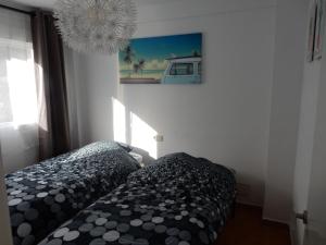 Llit o llits en una habitació de Casa Mediterranea