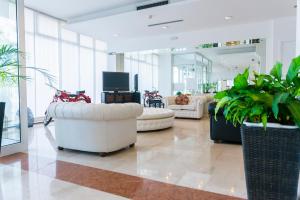 TV a/nebo společenská místnost v ubytování Venice Hotel