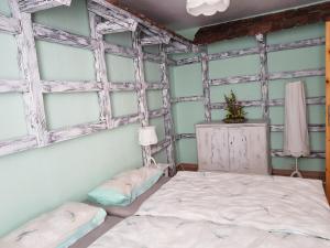 Postel nebo postele na pokoji v ubytování Spreewald Ferienwohnung Lübben