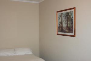 Säng eller sängar i ett rum på Mt Gambier International