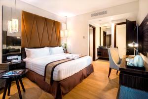 Vuode tai vuoteita majoituspaikassa The New Atrium Hotel Yogyakarta