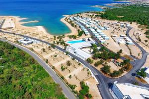 an aerial view of a beach and the ocean at Apartment Kiara in Omišalj