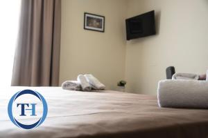 Postel nebo postele na pokoji v ubytování TH Assisi - Casa Leonori