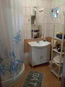 Kylpyhuone majoituspaikassa Apartments Kero