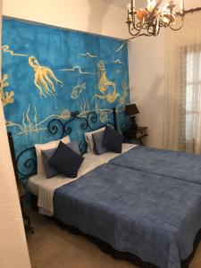 Voodi või voodid majutusasutuse Thalassa Hotel toas