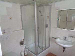 a bathroom with a shower and a sink at Haus Walch in Schönau am Königssee