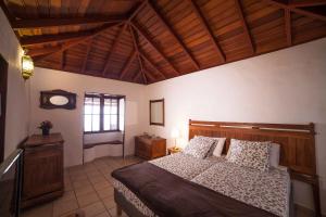 Giường trong phòng chung tại Villas Los Torres I
